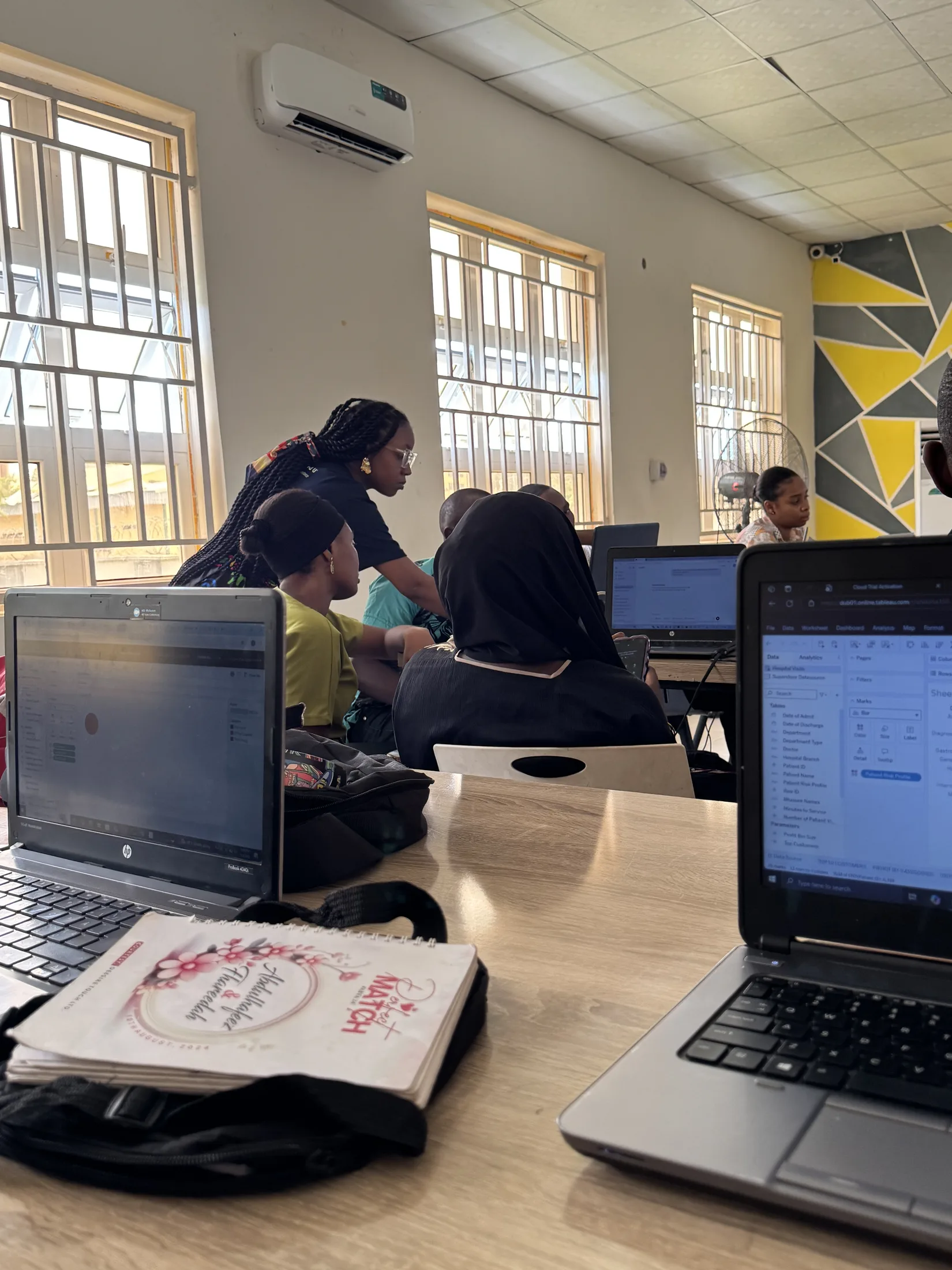 Joy Victor supporting learners during a data visualization class